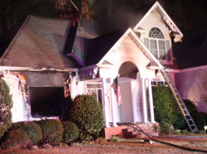 Neighbor notices house fire, calls 911