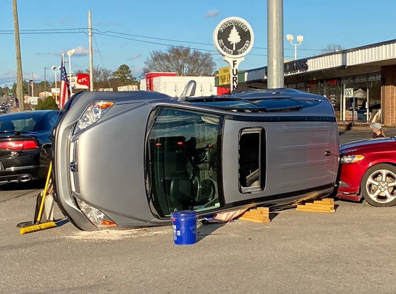 three-car accident leaves SUV on its side