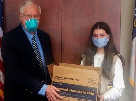 Local Girl Scout donates cookies to health department staff