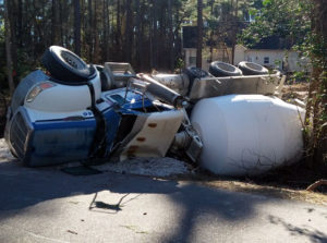 Concrete truck overturns in Woodlake