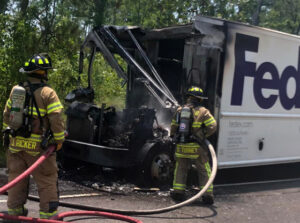 FedEx truck catches fire on Highway 690