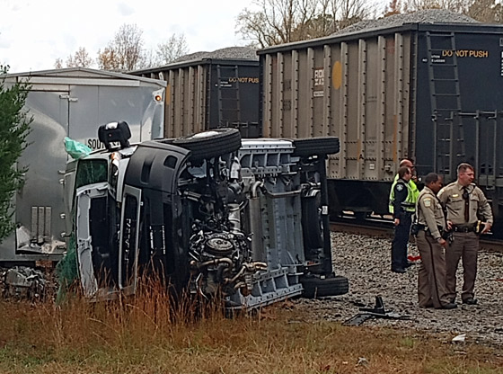 Driver injured after freight train hits vehicle in Aberdeen