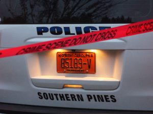 Rape suspect in custody after long standoff in Southern Pines