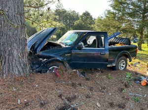 Driver crashes into tree on Highway 211