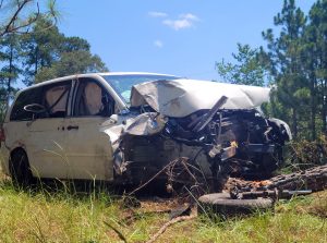 Cameron driver survives head-on crash with tree
