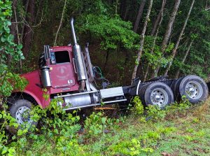 Semi slams into ditch