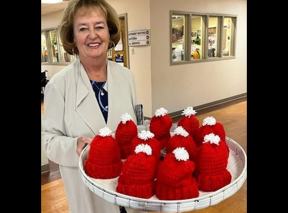 Volunteer knits more than 10,000 caps for newborns at Central Carolina Hospital