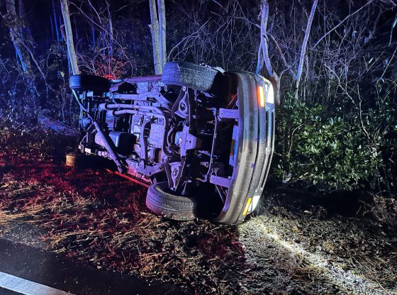 Driver flees after flipping truck