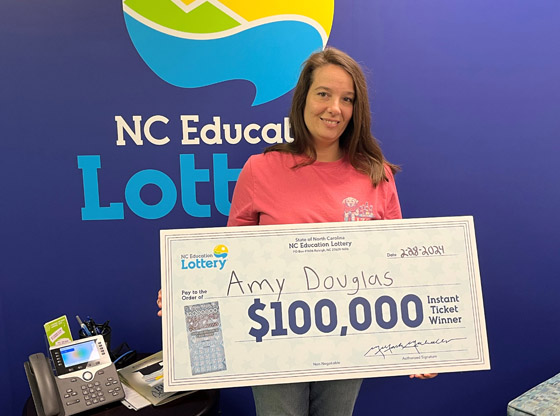 Cameron woman brought to tears after winning $100K on scratch-off