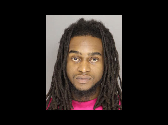 Wanted man arrested on drug, gun charges