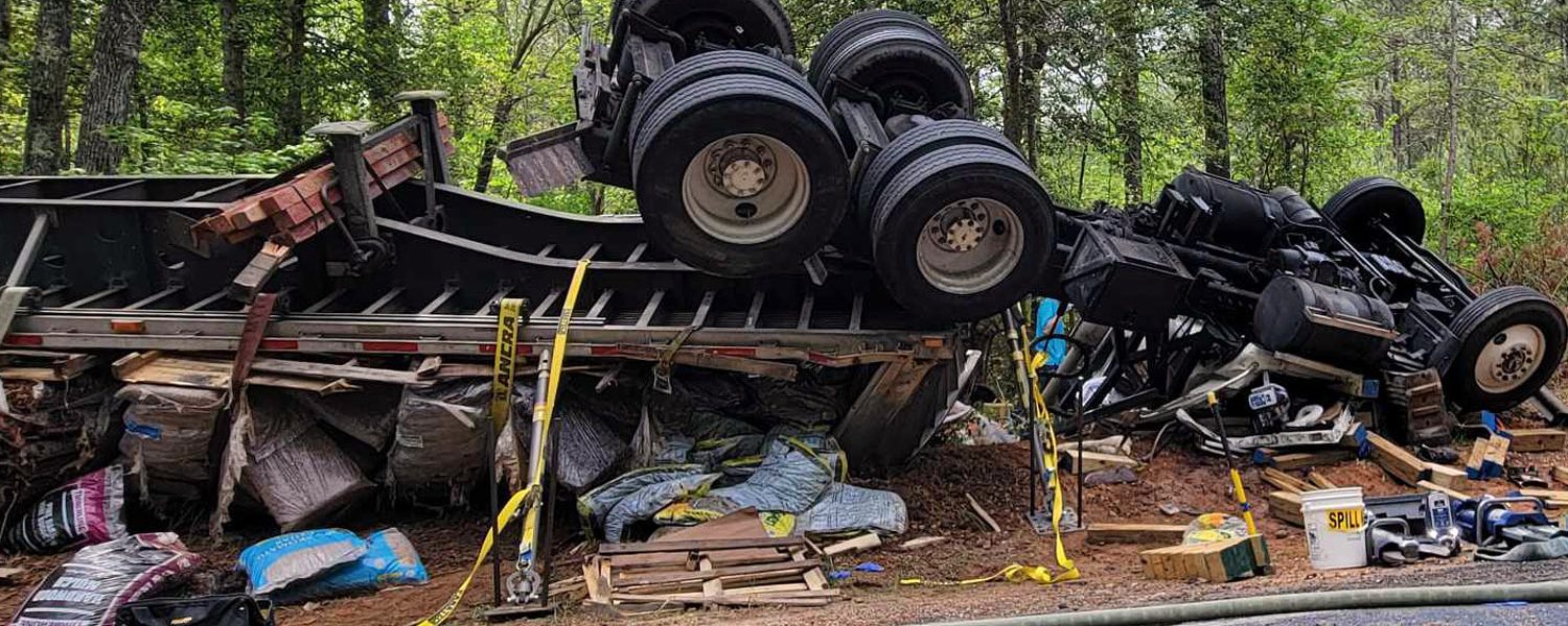 Trucker airlifted after semi overturns near Jackson Springs