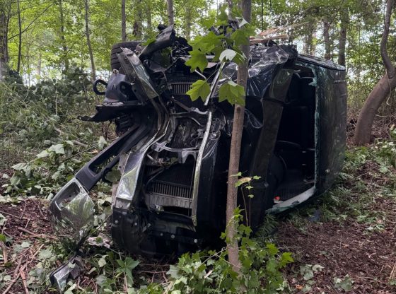 Driver transported after crashing into woods near Cameron