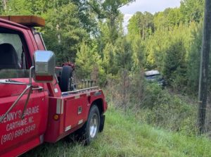 Family avoids serious injury after veering from roadway in Carthage