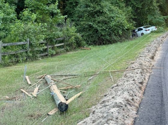 Driver transported after crashing through power pole in Vass 2