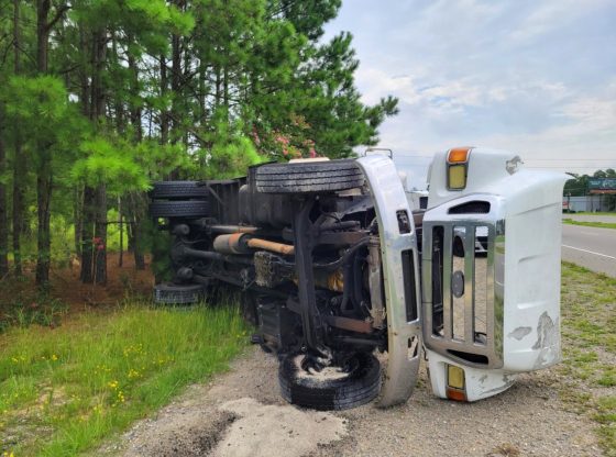 Driver safe after truck overturns in Vass