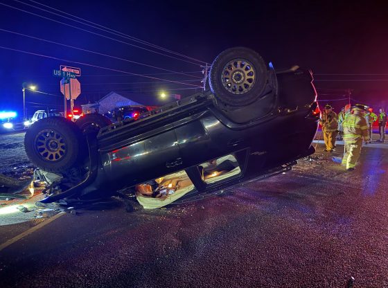 Vehicle flips near Vass