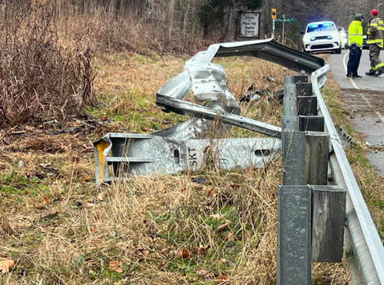 Group home van crashes through guardrail into the woods 