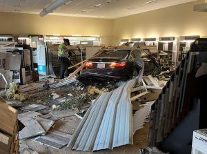 Car crashes into carpet store