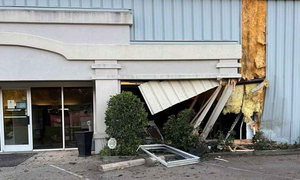 Car crashes into Vass carpet store