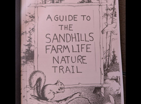 Former third-grade students surprise Sandhills Farm Life teacher Ken Loyd