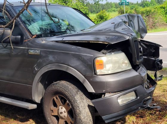 Pickup truck crashes into tree in Cameron
