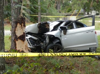 Bystanders pull driver from burning car, perform CPR