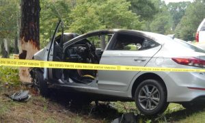 Bystanders pull driver from burning car, perform CPR