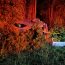 Man injured after crashing into woods near Vass