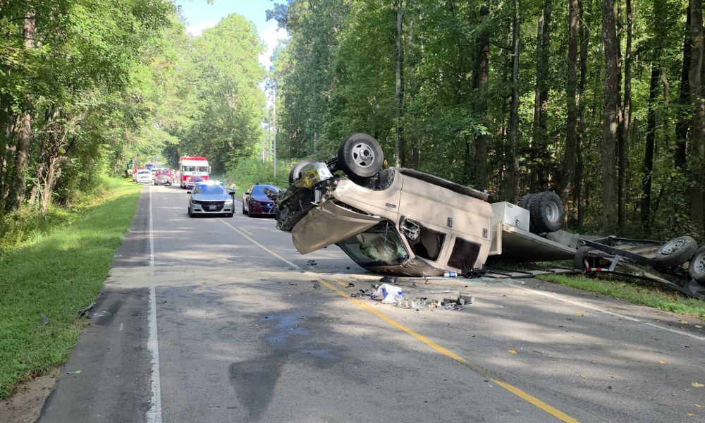 School bus and truck collide, shut down road for hours