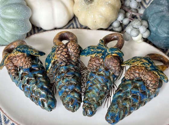 Pottery pinecones to be hidden along Moore trails this fall