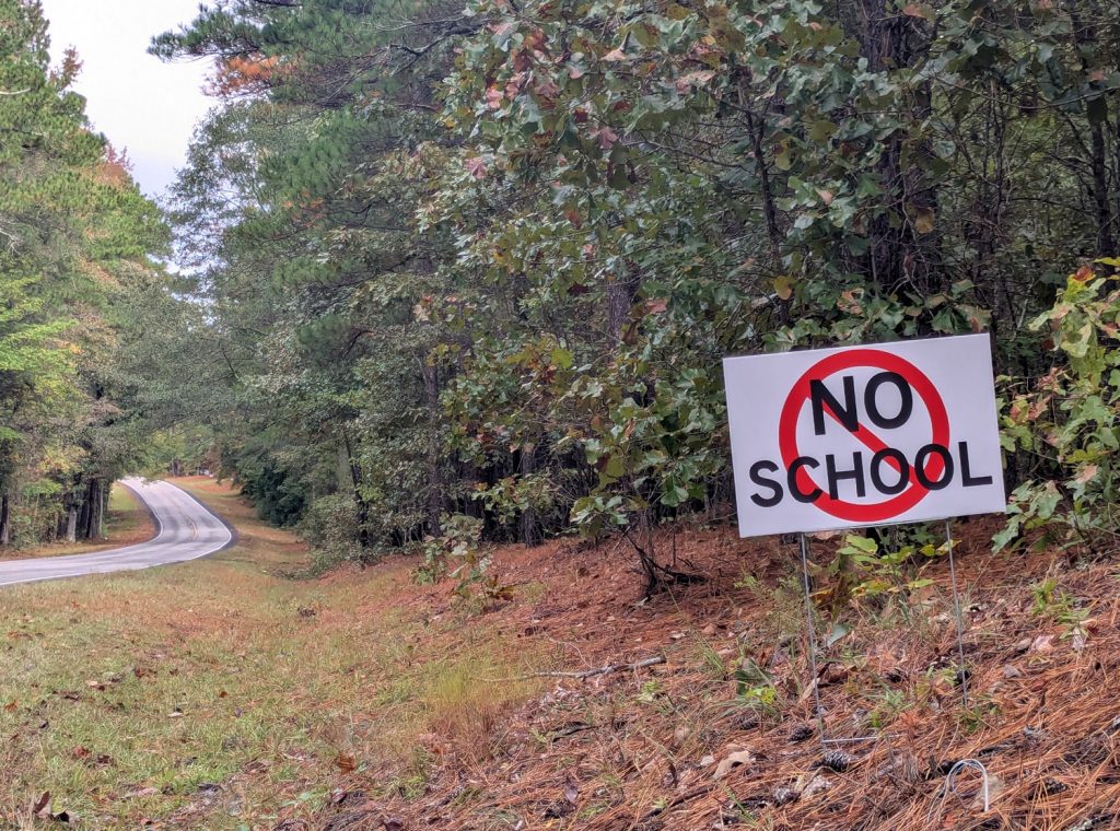 Board of Education, commissioners clash over proposed school placement