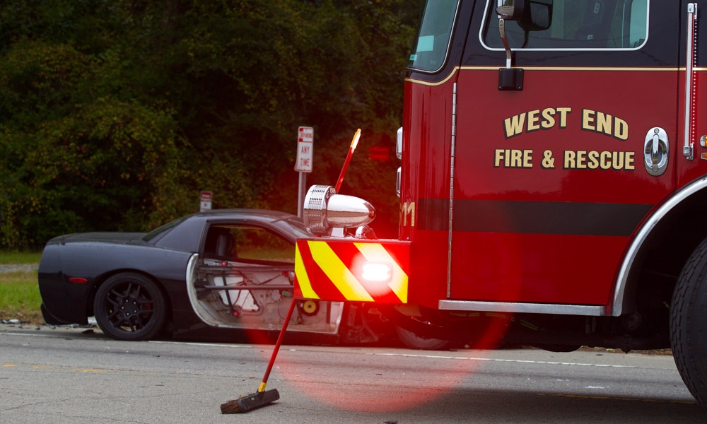18-wheeler runs over Corvette car