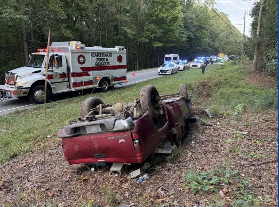 Driver in police custody after flipping truck in Carthage