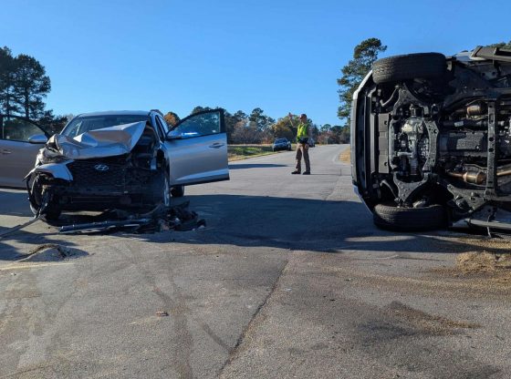 Two transported after vehicles crash, flip at Carthage intersection