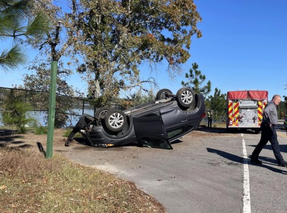 Driver trapped, injured after vehicle overturns in Pinehurst
