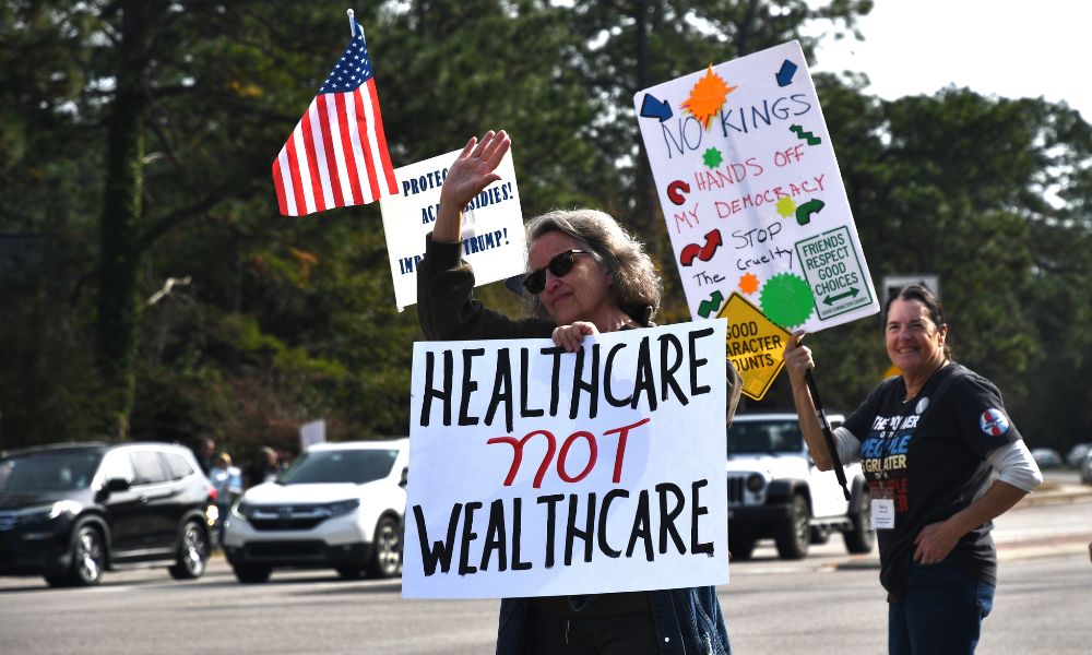 Indivisible Moore County holds healthcare-centered protest near hospital