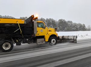 DOT treating roads, urging you to avoid travel during snow storm
