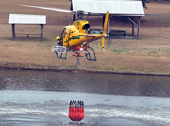 Multiple departments battle intense forest fire in Vass