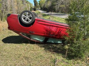 Driver transported after vehicle rolls in Robbins