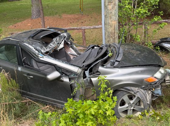 One airlifted after power pole crash