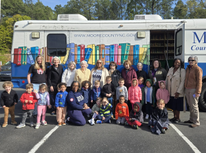 Giving Circle donation helps fill Bookmobile shelves for local kids