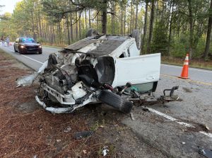 Hunters help driver from car after Cameron crash