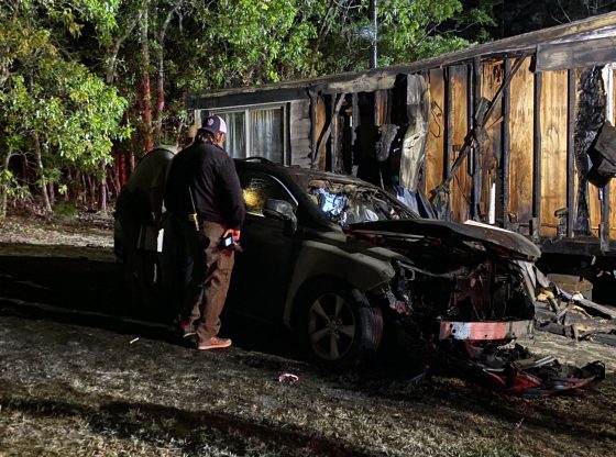 Vehicle fire spreads to home in West End