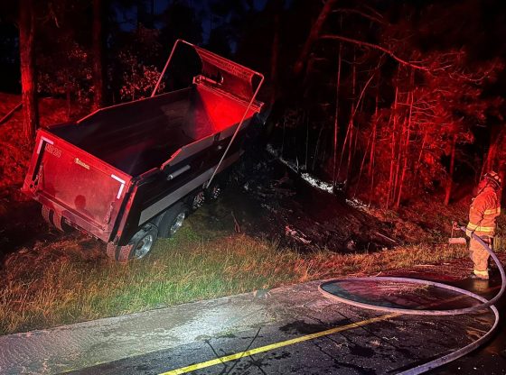Smartphone crash activation alerts 911 of dump truck crash, fire