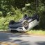 Car lands on roof after rollover crash in Cameron