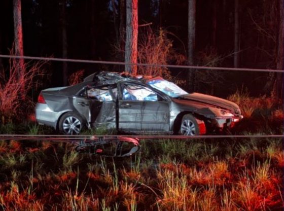 Driver uninjured after car flips in West End
