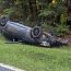 Car overturns while avoiding a deer